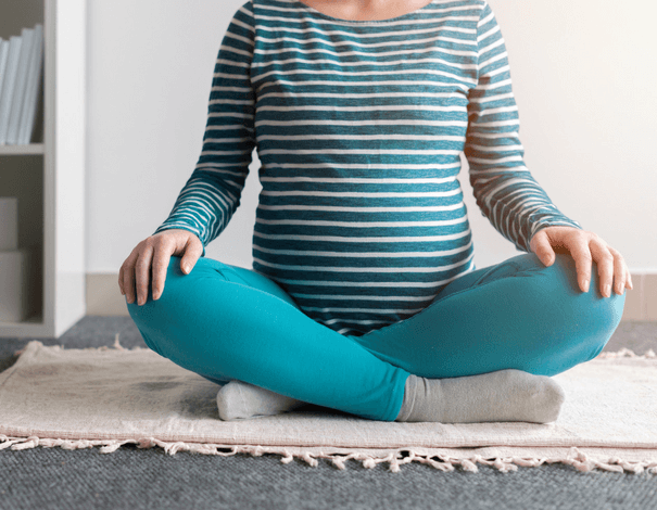 Pregnant Woman doing yoga
