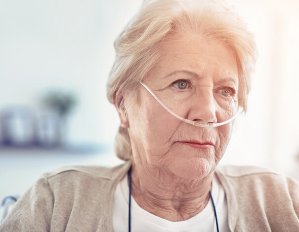 senior woman with oxygen tube suffering from COPD senior woman with oxygen tube